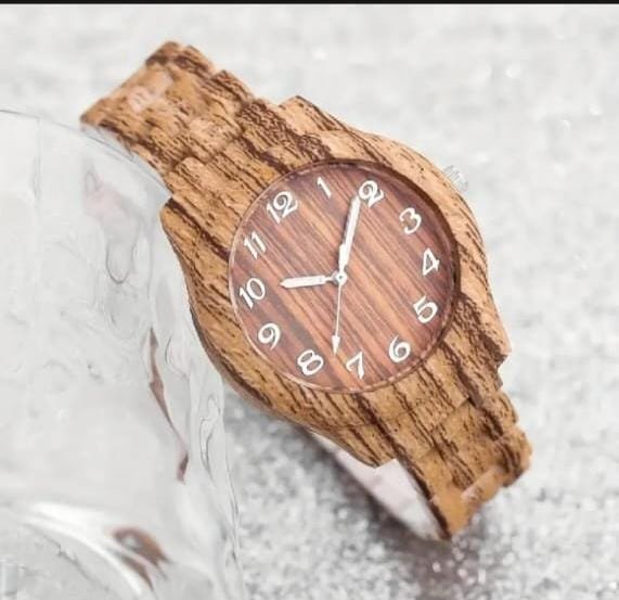 IMG-20260811-WA0119 Fashion Women Watches Casual Wooden Pattern Plastic Band Quartz Watch Relogios Feminino(Without Box)